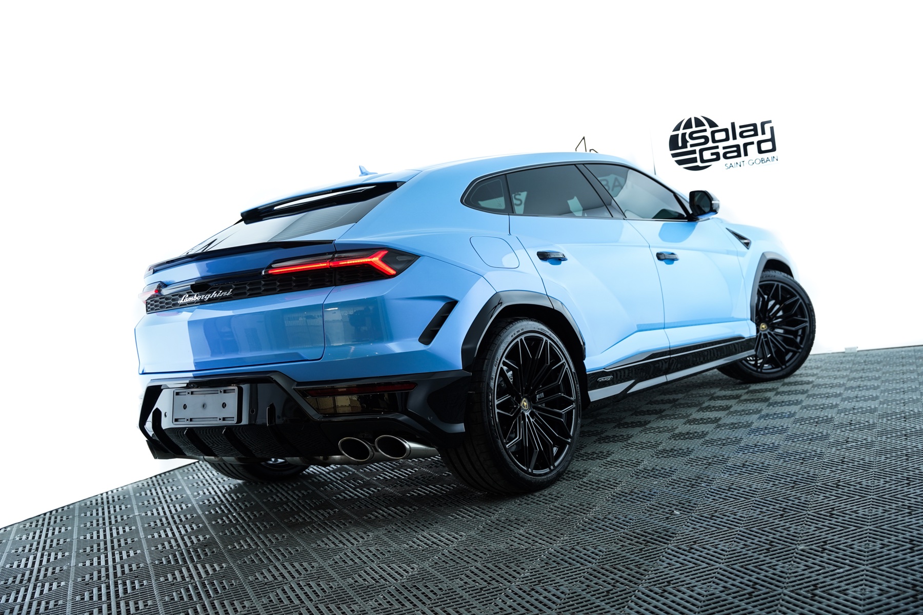 Blue Lamborghini Urus colour finish inside a clean studio